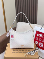 Coah handbag, light gray patterned canvas with gold chain shoulder strap