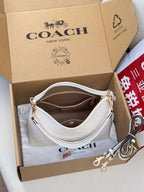 Coah handbag, light gray patterned hobo bag with chain handle and leather trim