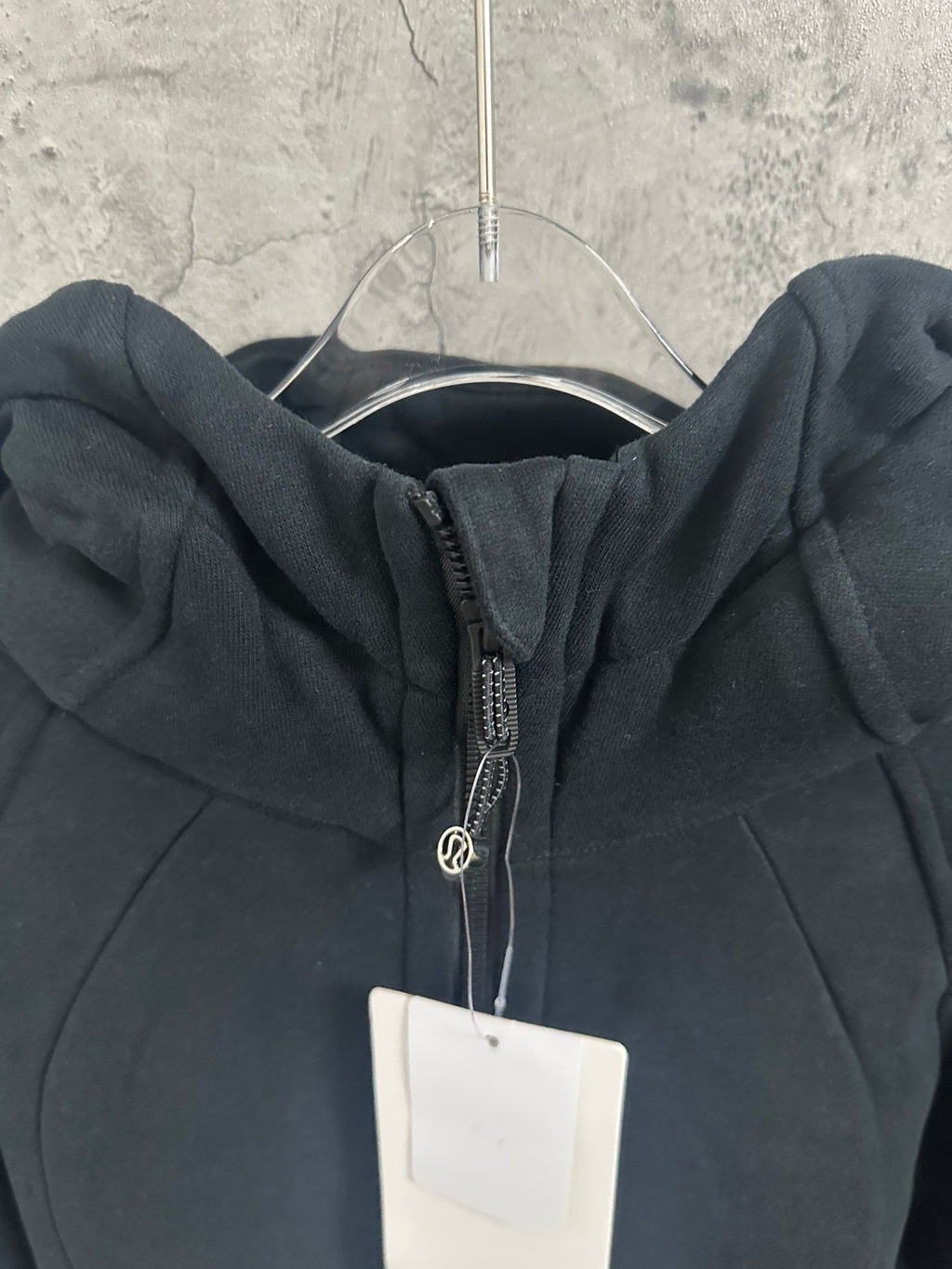 Dark hoodie front zipper and hood with metal pull