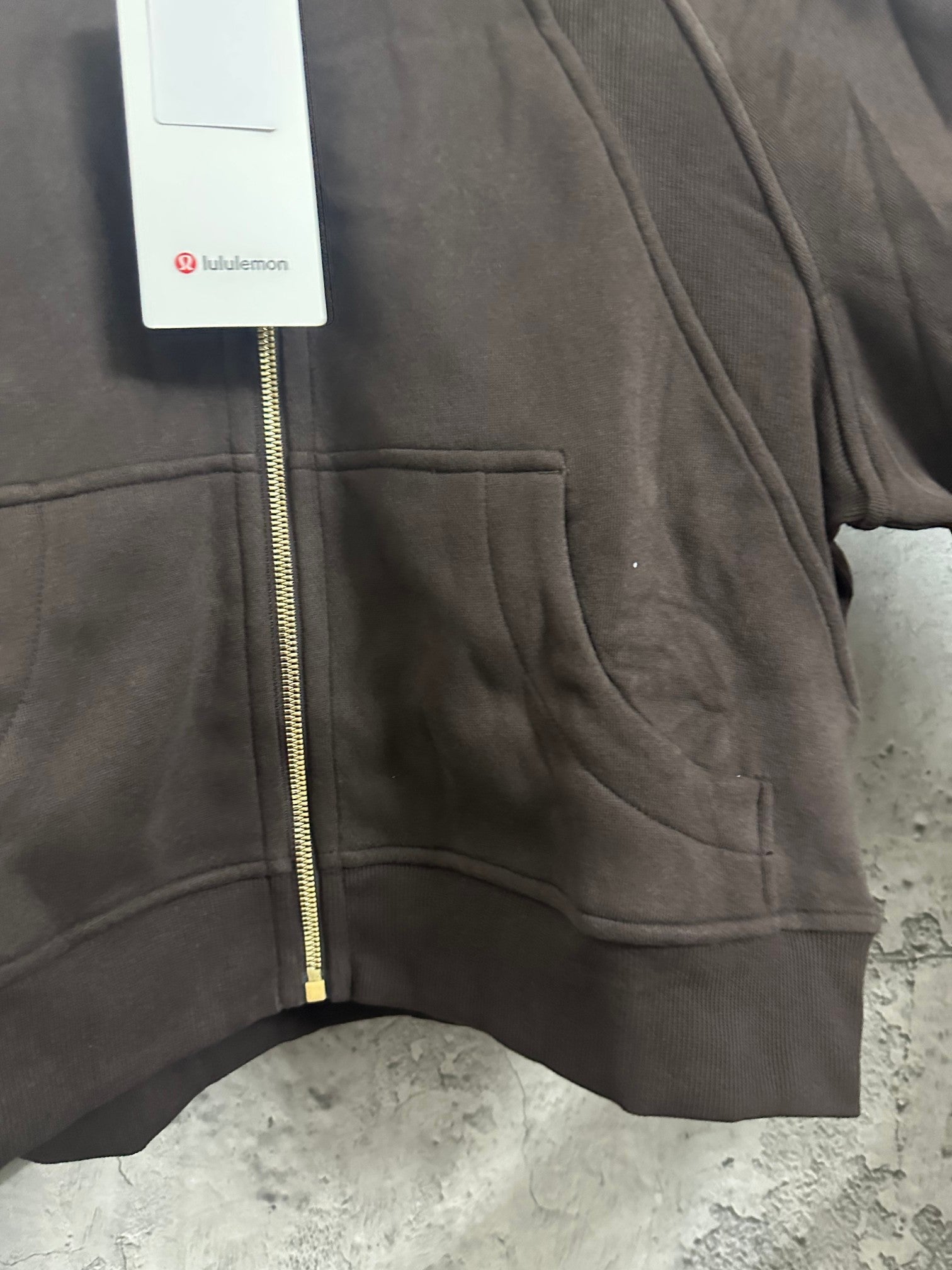 Ralph Lauren front pocket and gold-trim zipper on dark charcoal zip hoodie