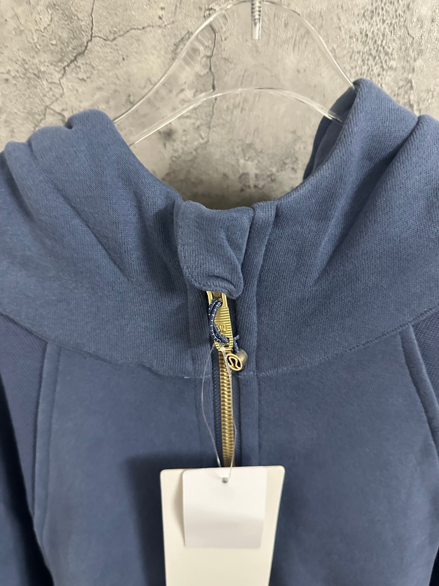 Ralph Lauren blue zip-up hoodie close-up of front zipper and hood opening