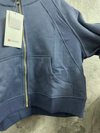Ralph Lauren blue zip-up hoodie showing front pocket and zipper seam