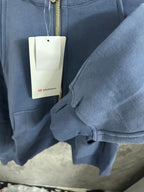 Ralph Lauren blue zip-up hoodie sleeve cuff detail with front gold zipper