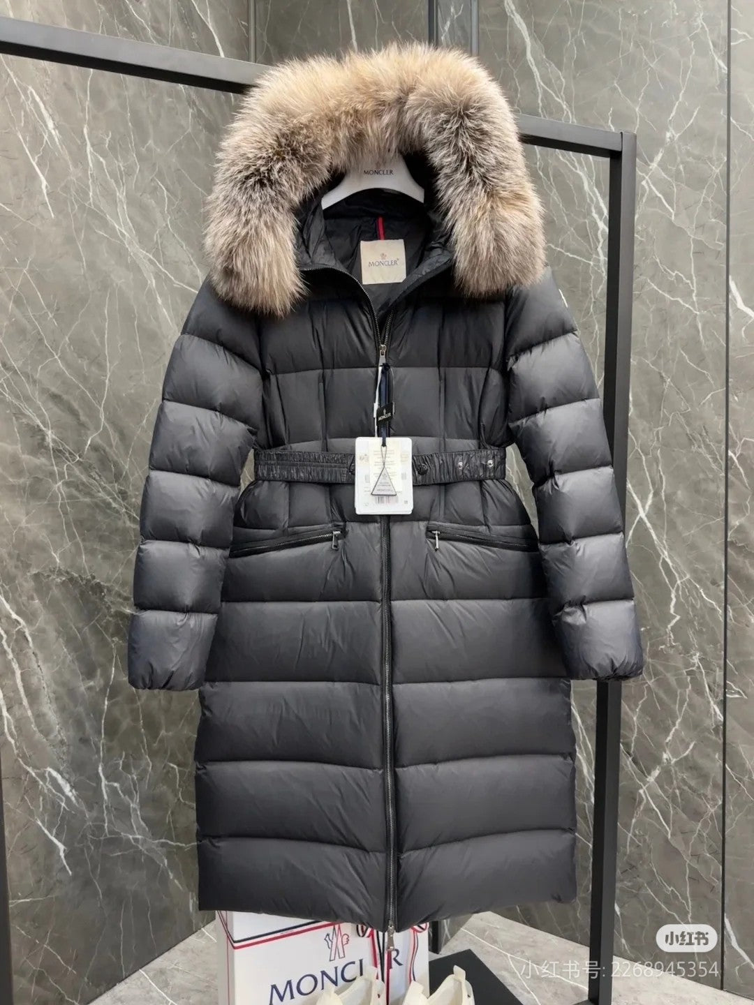 Moncler long puffer coat with faux fur hood, dark color, straight front zipper