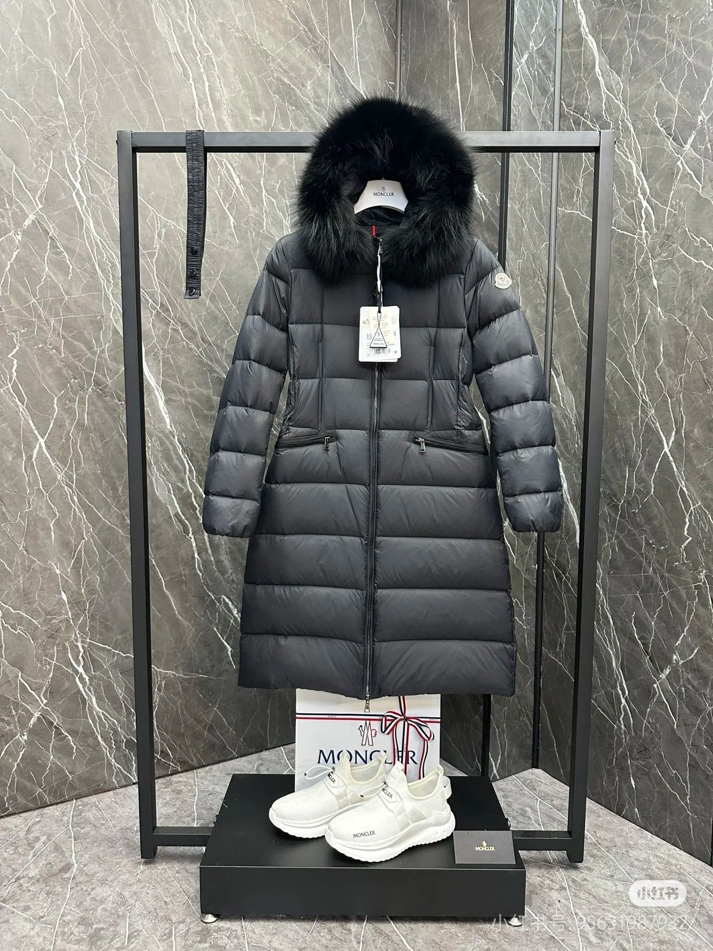 Moncler long puffer coat with faux fur hood, dark color, front zipper