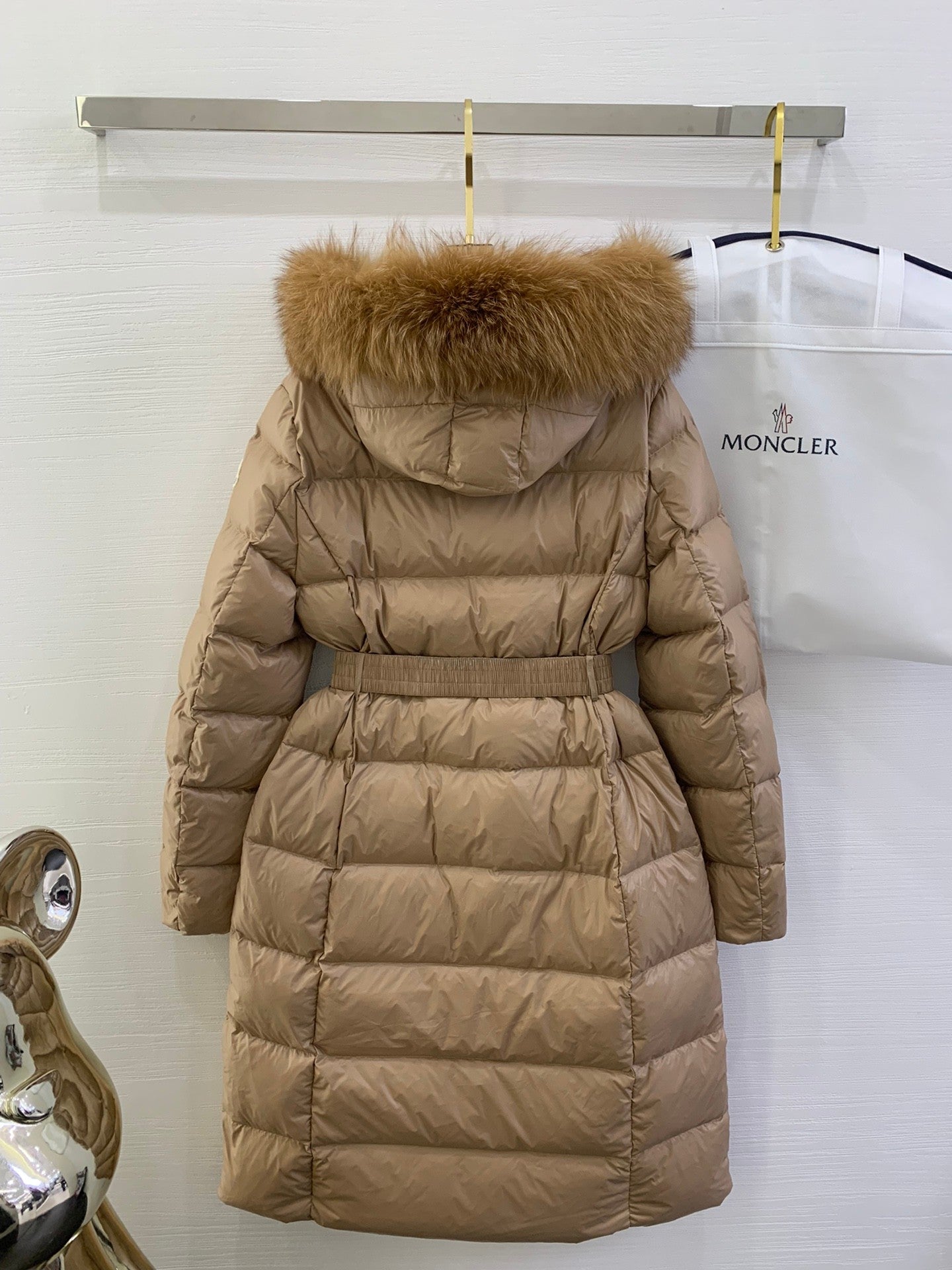 Moncler long puffer coat with fur-trim hood, belted waist, tan