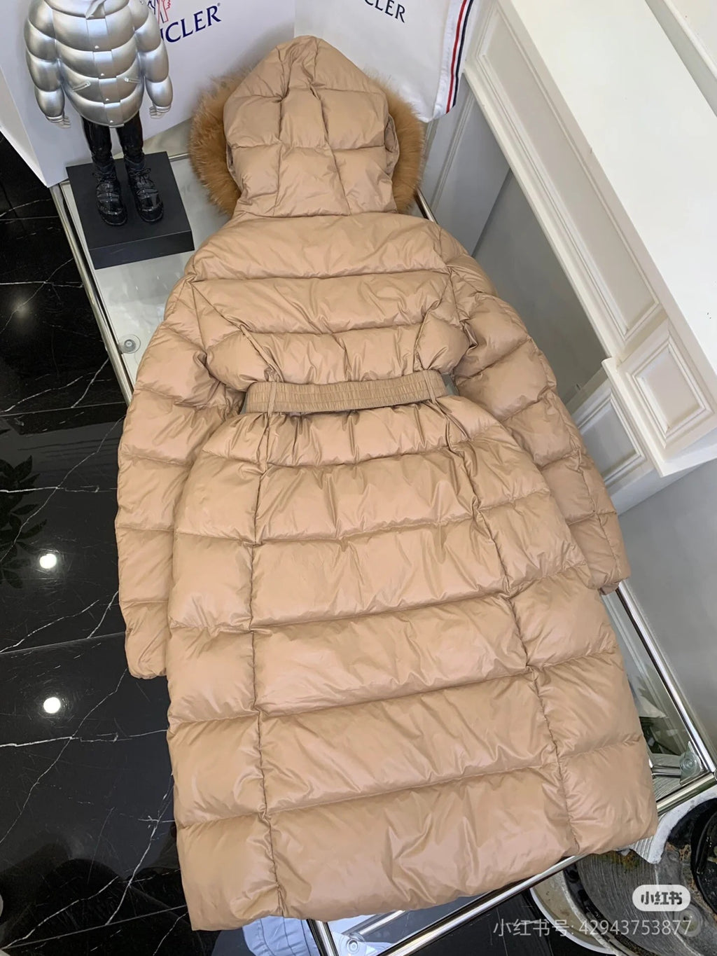 Moncler long puffer coat with fur-trim hood and belt, tan back view