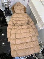 Moncler long puffer coat with fur-trim hood and belt, tan back view