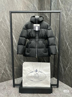 Black hooded puffer jacket with full zip and elastic waist, front view