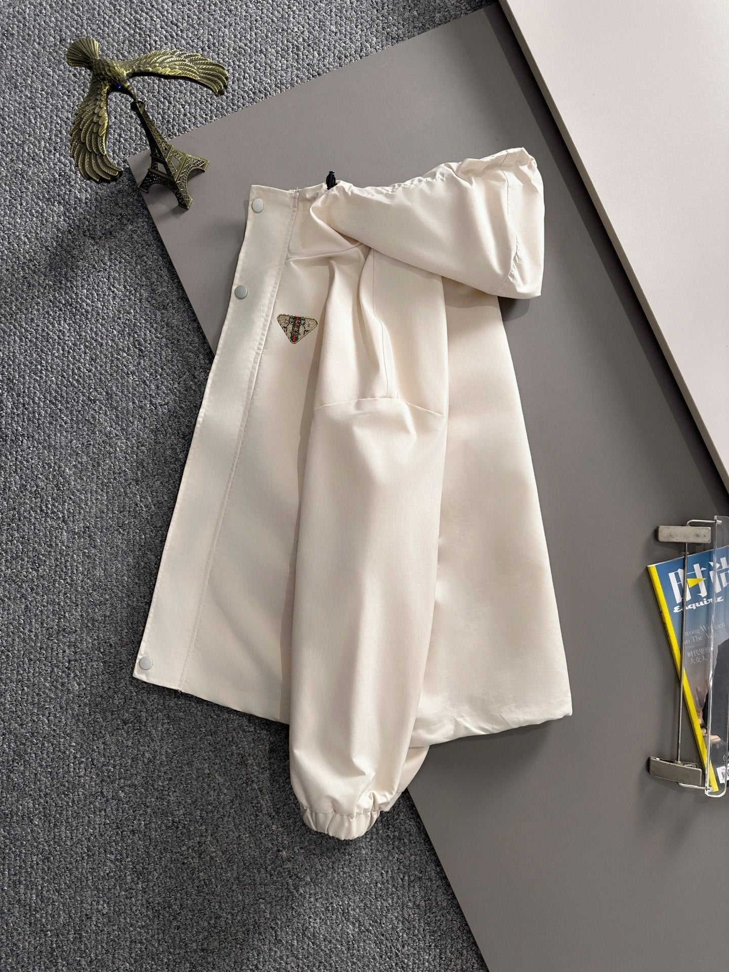Off-white hooded long jacket with relaxed fit and zip front