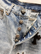 Light blue denim Chrome pants with button fly and small star patch detail on pocket