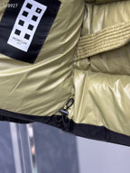 Moncler logo patch on neon hood lining long puffer jacket sleeve cuff