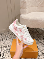Louis Vuitton white sneakers with pink floral pattern on sides and cushioned low profile