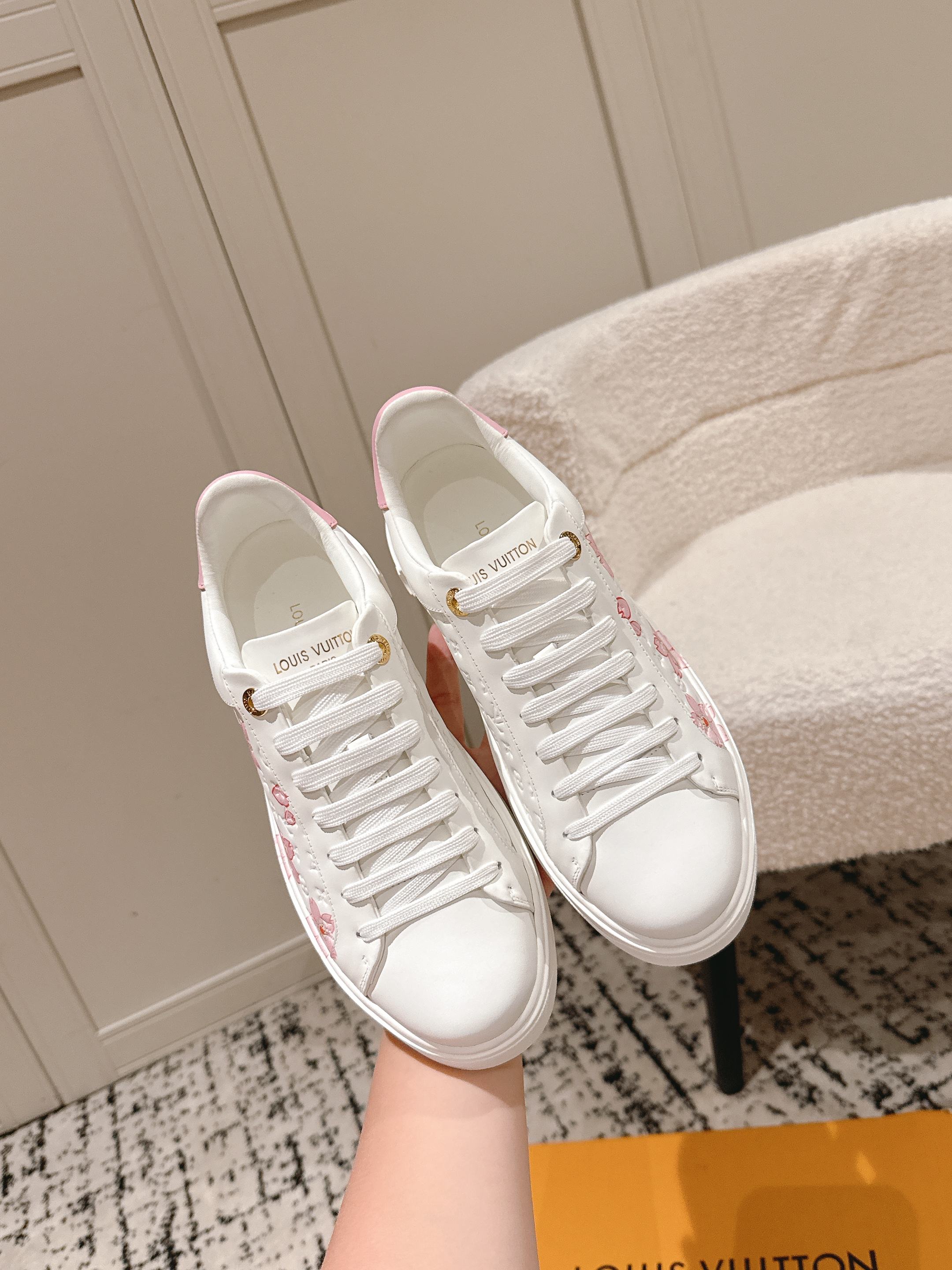 Louis Vuitton white sneakers with pink floral side print and white rubber sole