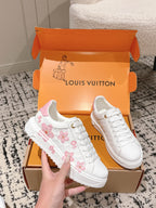 Louis Vuitton white sneakers with pink floral embroidery and textured rubber sole