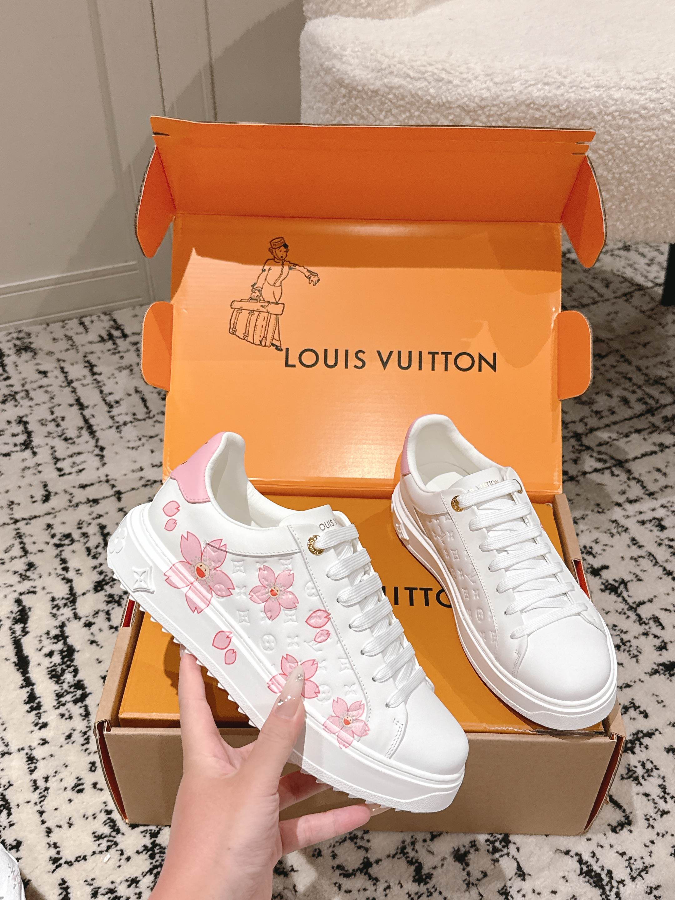 Louis Vuitton white sneakers with pink floral embroidery and textured rubber sole