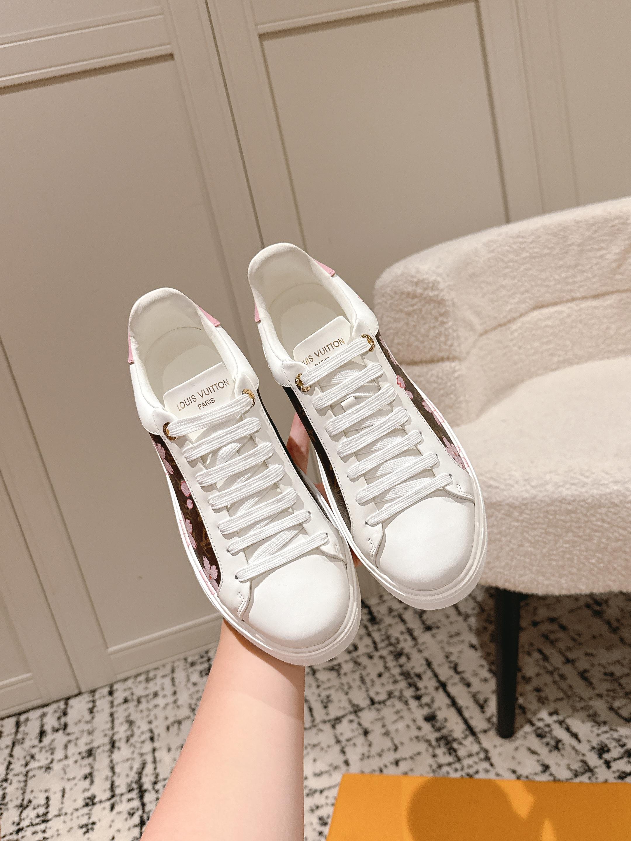 Louis Vuitton white low-top sneakers with white laces