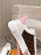 Louis Vuitton white low-top sneakers with pink heel patch and brown monogram side