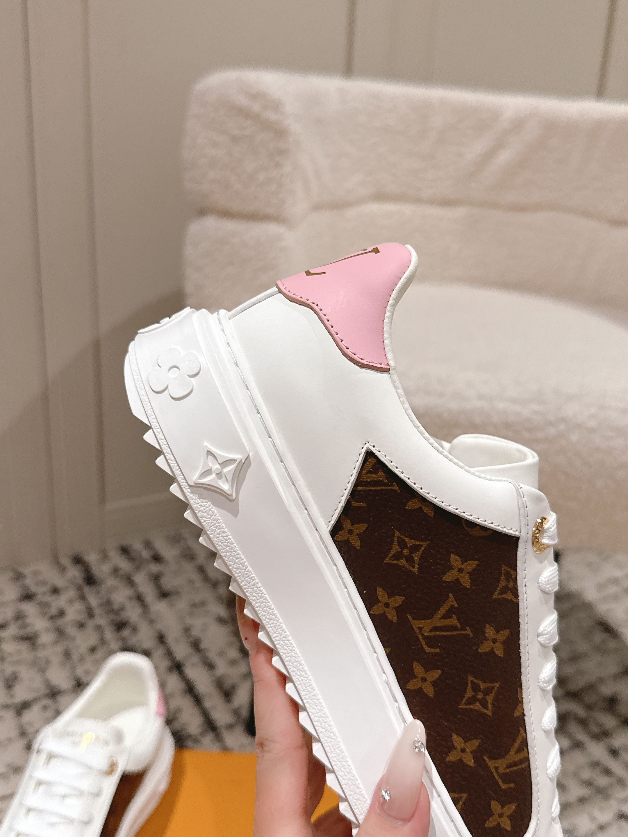 Louis Vuitton white low-top sneakers with pink heel patch and brown monogram side