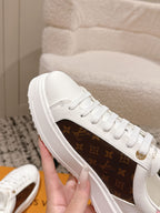 Louis Vuitton white low-top sneakers with brown monogram side stripe