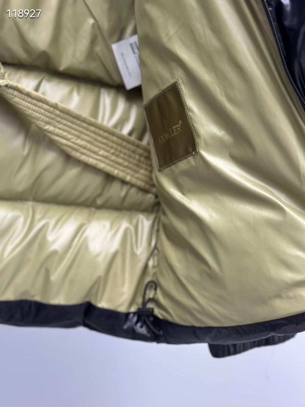 Neon lining long puffer jacket with ribbed inner cuff and black hem stripe