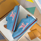 Light blue Louis Vuitton unisex sneakers with large LV logo, brown accents, striped sole