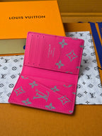 Small pink patterned card holder with fold-over flap and stitched edge detail