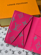 Small pink patterned card holder with multiple card slots and fold-over flap