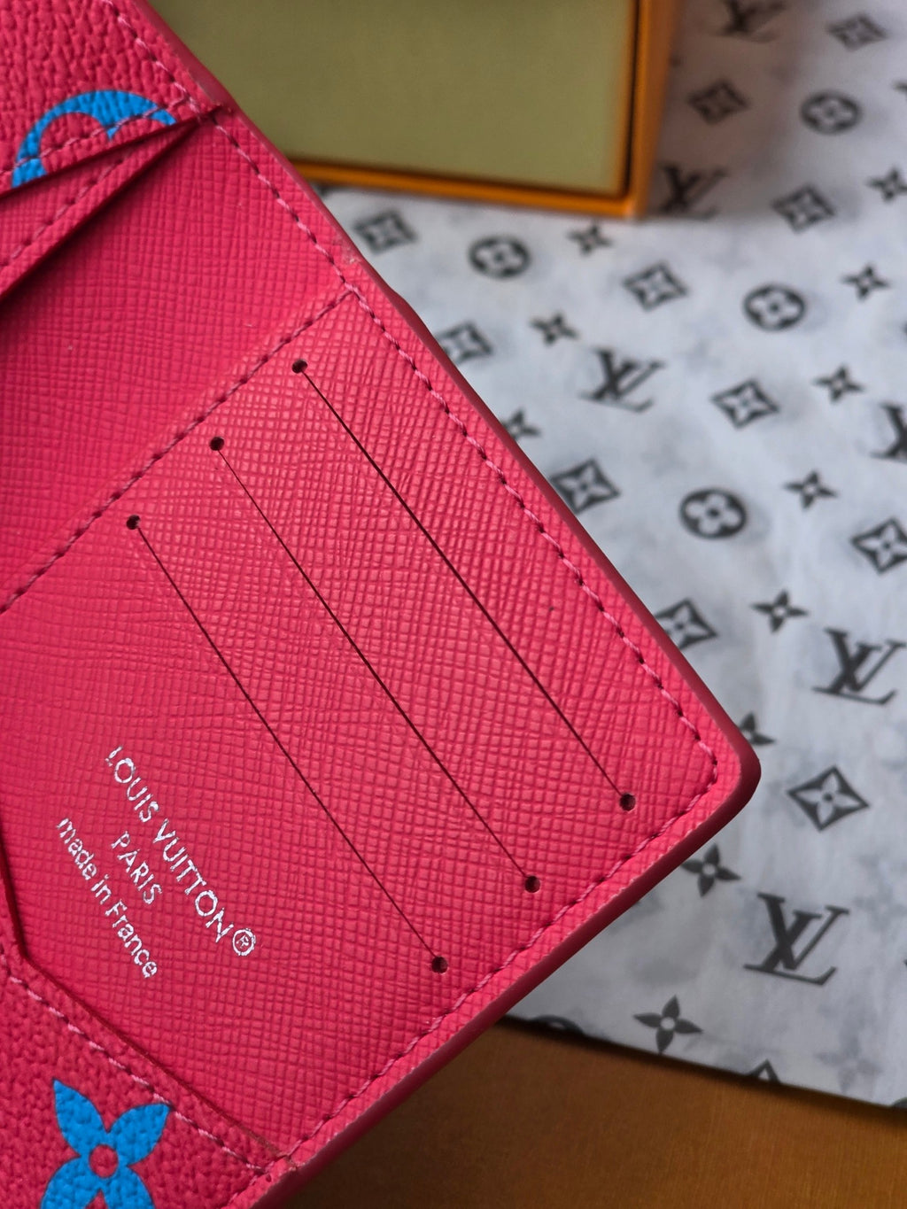 Small bag interior in pink with stitched panel and card-slot section