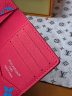 Small bag interior in pink with stitched panel and card-slot section