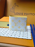 Small card wallet with blue monogram pattern, beige trim, Louis Vuitton logo