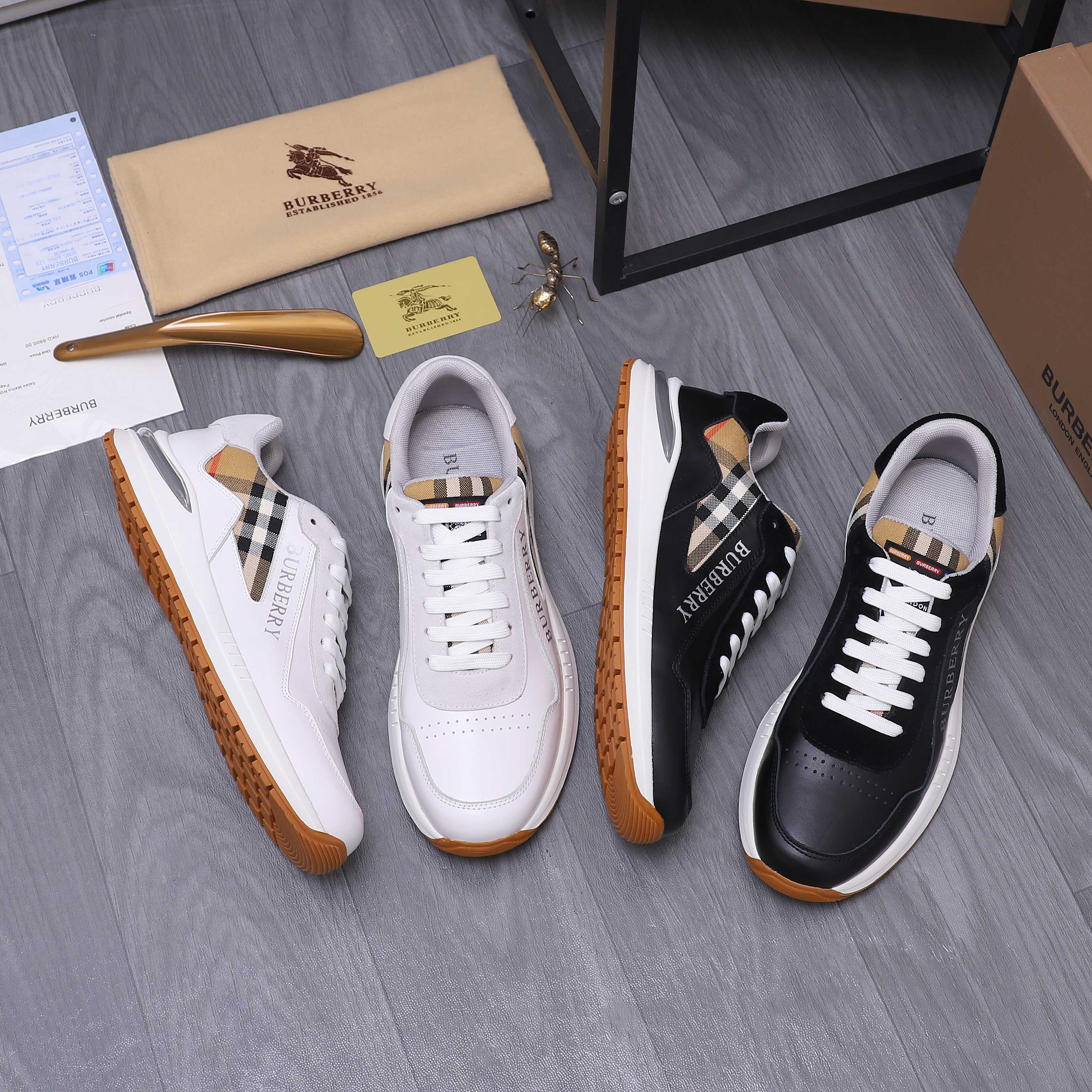 Set of luxury sneakers: white-and-black pair plus black pair with check accents