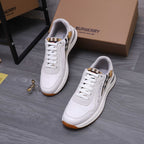 White Burberry low-top sneakers with plaid detail and gum rubber sole