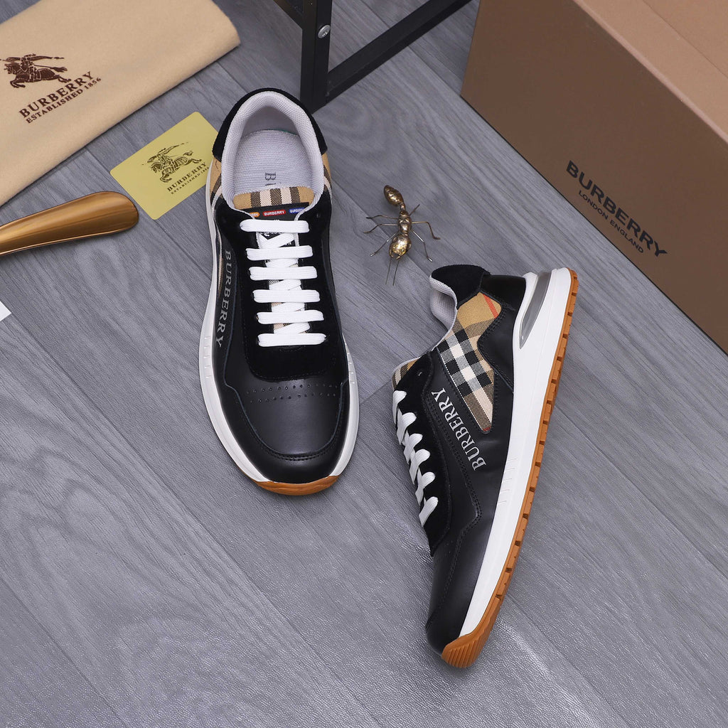Black luxury sneakers with check-pattern tongue detail, white laces, and rubber sole