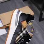Luxury sneaker side view with check-pattern collar and black upper on white sole