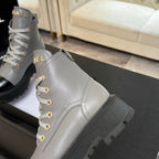 Chanel ladies high-top sneaker, light gray leather with lace-up front and ridged sole