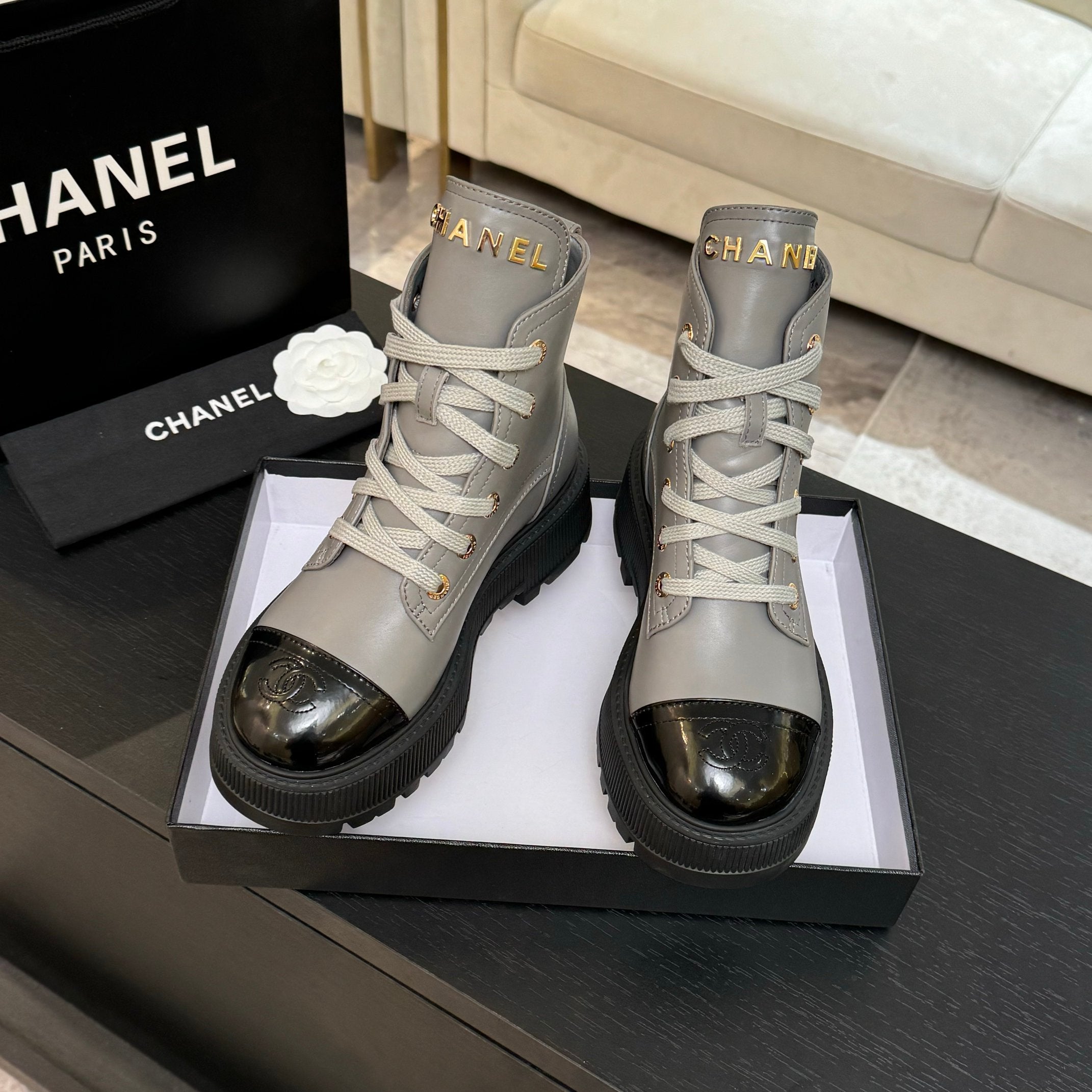 Chanel ladies high-top sneakers, light gray leather with black toe caps and lace-up style