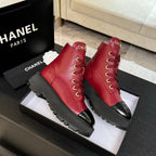 Chanel ladies red lace-up high-top boots on a box with black platform soles