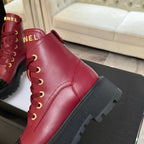 Chanel ladies red lace-up high-top boot side view with gold eyelet lacing