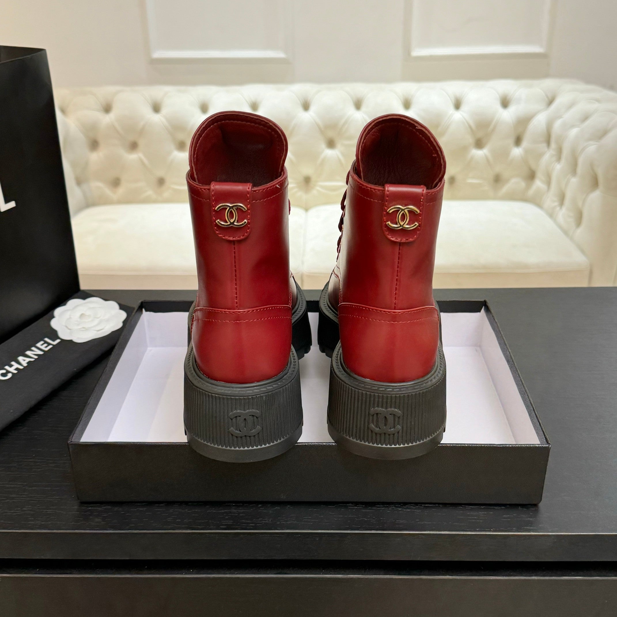 Chanel ladies red lace-up high-top boots rear view with black platform soles