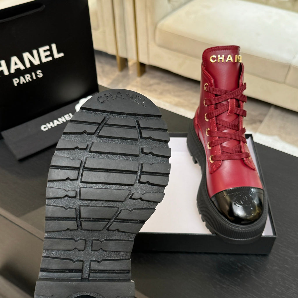 Chanel ladies red lace-up boot with black treaded outsole visible