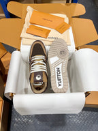 Louis Vuitton trainer sneakers front view with dark brown camo uppers and white laces