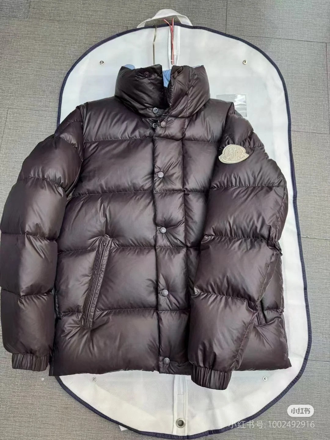 Moncler long puffer jacket with hood, dark quilted puffer, front zipper, small round logo