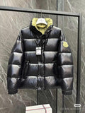 Moncler long puffer jacket with hood, dark finish, front zipper, logo patch at sleeve