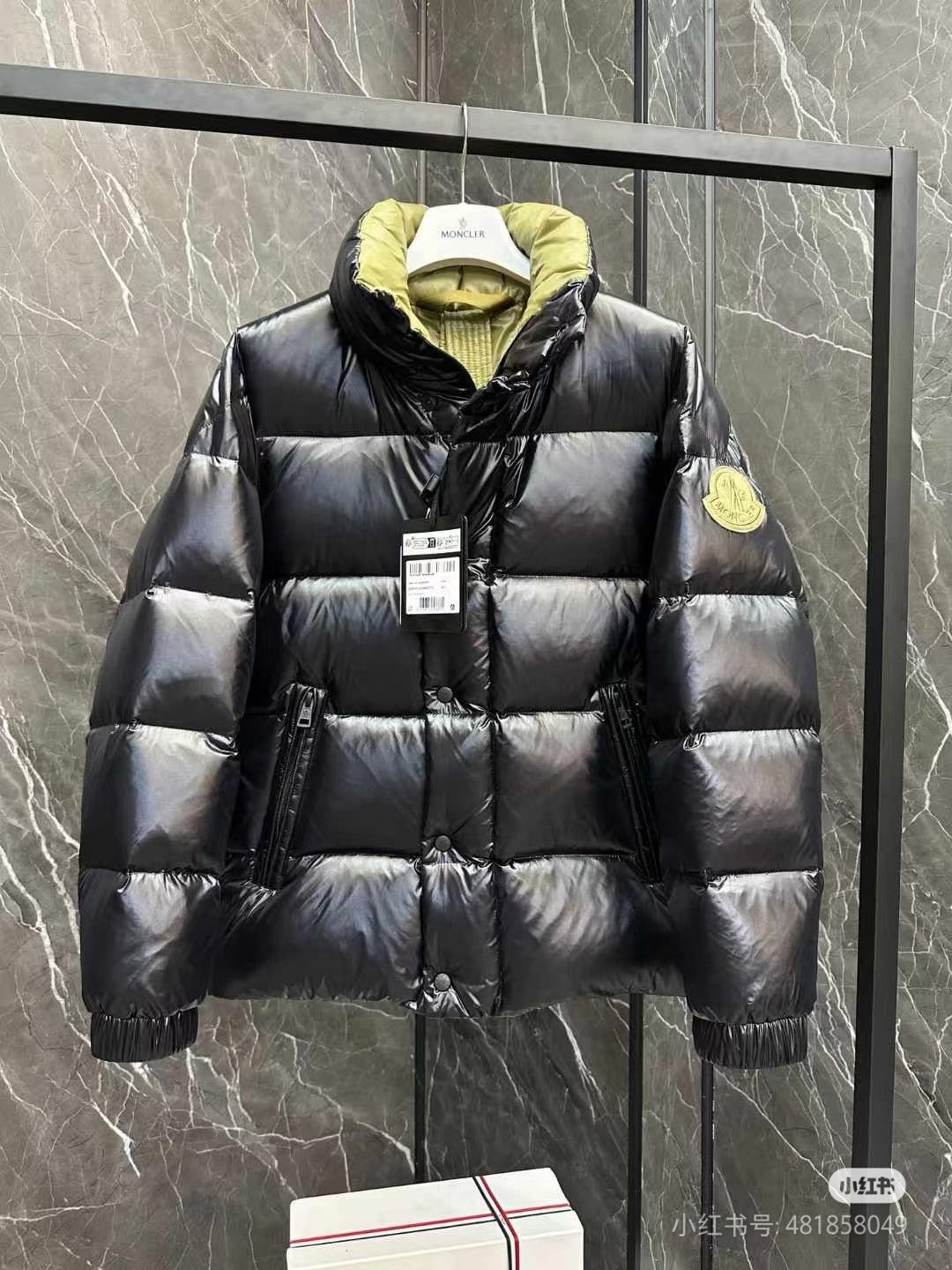 Moncler long puffer jacket with hood, dark finish, front zipper, logo patch at sleeve