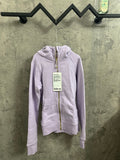 Light purple zip-up hoodie with hood and gold-toned front zipper