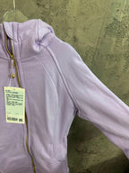 Light purple hoodie close-up: shoulder and sleeve with ribbed cuff