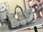 Louis Vuitton duffel bag in dark gray monogram canvas with top handles and leather trim
