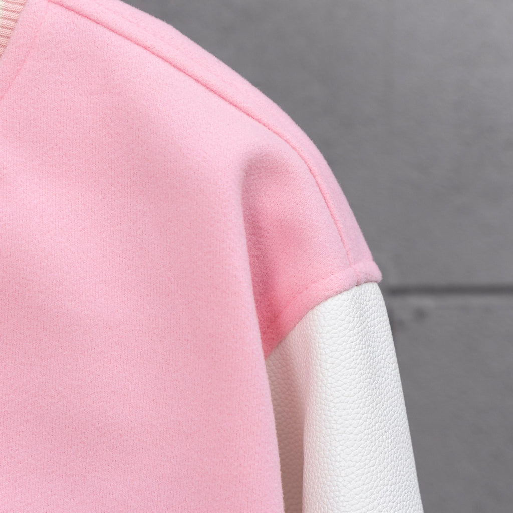 Pink fabric sleeve with ribbed white cuff