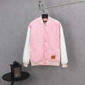 Pink varsity-style jacket with snap buttons and white-striped ribbed cuffs